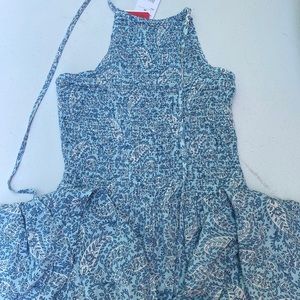 Romper that ties in back has pants